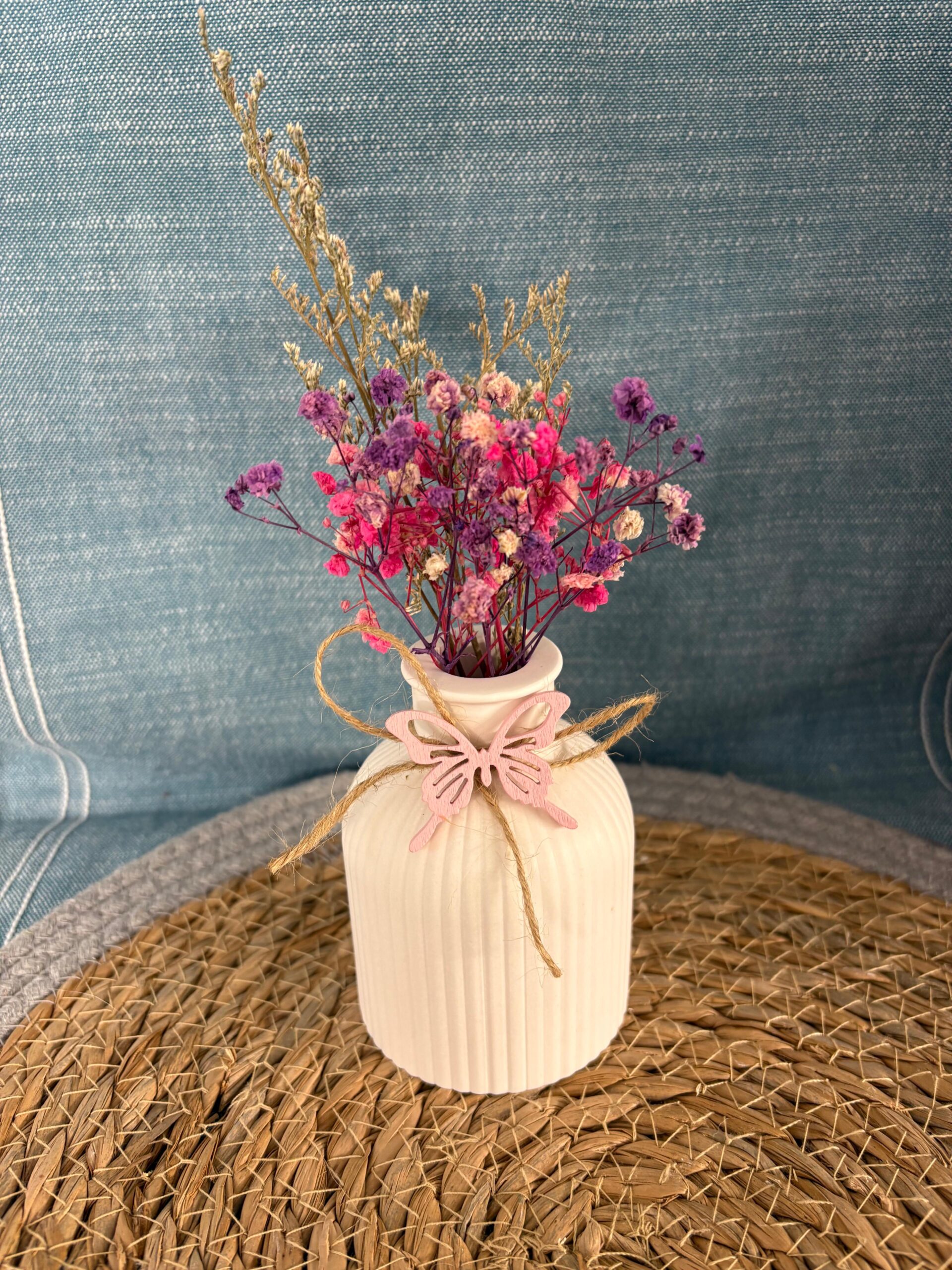 Vase mit Schmetterling